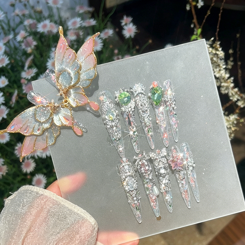 The new flash spring and summer filigree butterfly wears armor, and the spring atmosphere shows whitening nail art