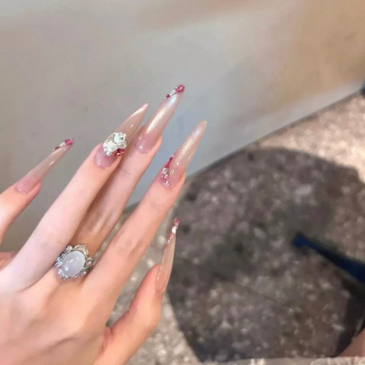 Summer's hottest glass bead cat eye gel polish! this porcelain white, high-density magnetic powder creates a stunning, high-end, and intensely shimmering cat eye effect that really makes your nails pop