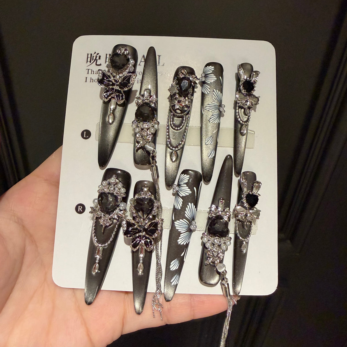 Handmade press-on cat eye nail art, long european and american style, heavily detailed dark goth press-on nails