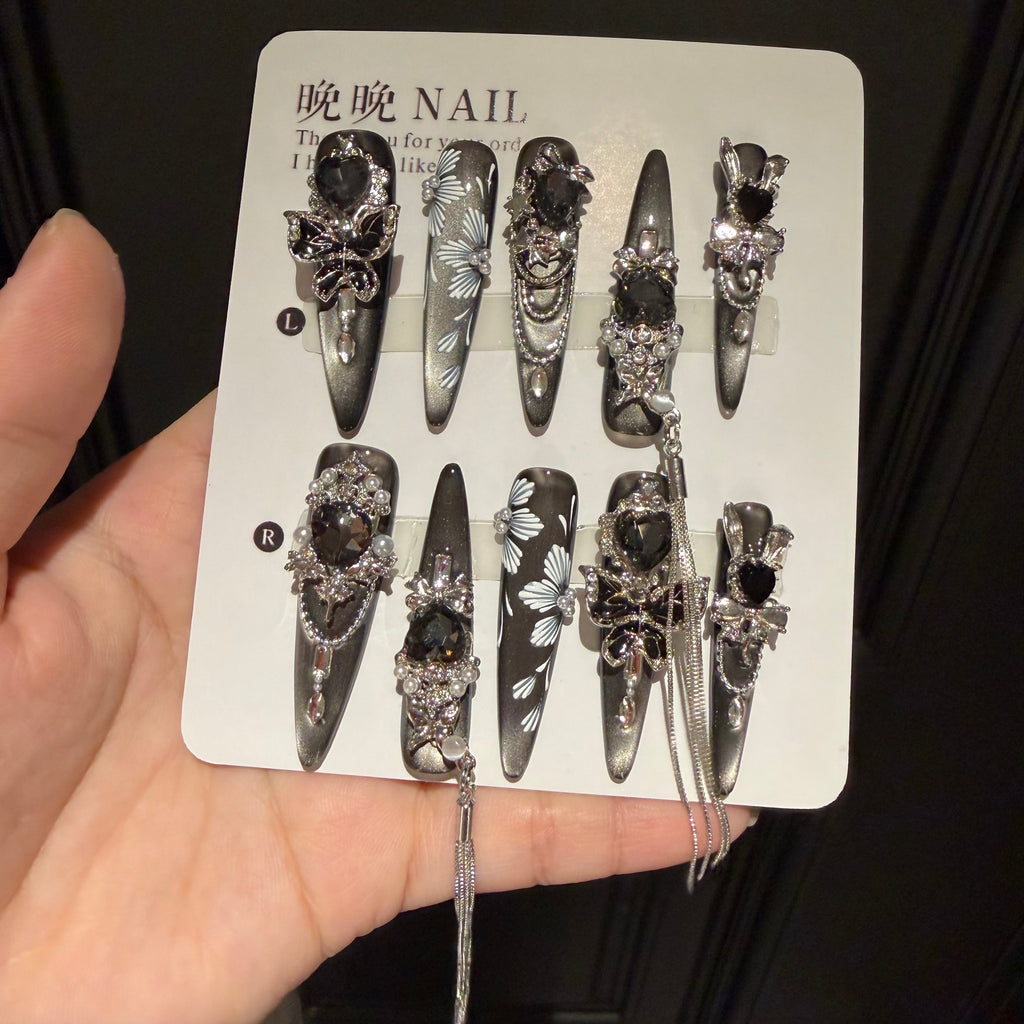Handmade press-on cat eye nail art, long european and american style, heavily detailed dark goth press-on nails