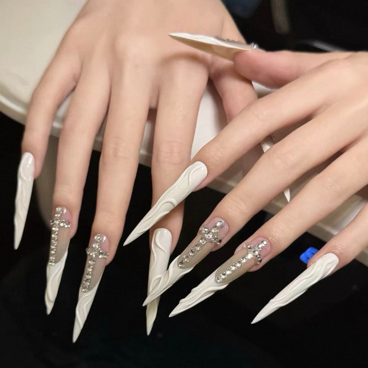 Handmade custom irregular water ripple hot girl pointed tip press-on nails with cross and crushed diamond accents - luxurious and flattering